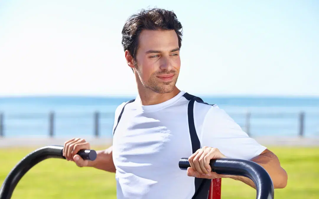 man fitness and shoulder press at park for workout