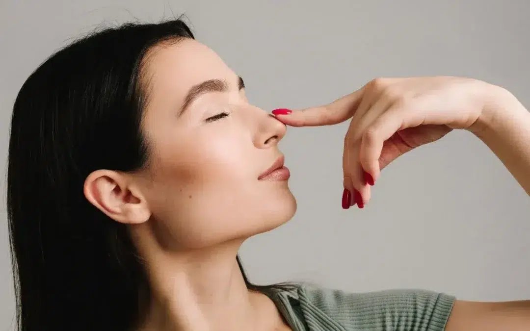 young girl is suffering from deviated nasal septum