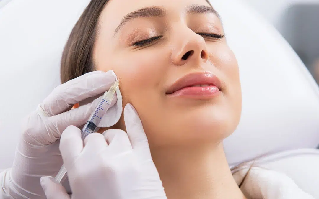 young lady on procedure of cheek zone