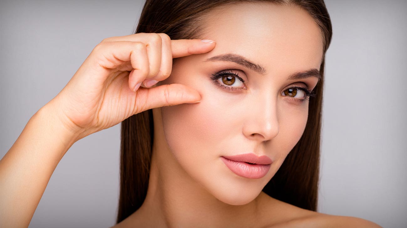 Closeup photo of beautiful lady nude naked shoulders plump shape lips tempting appearance fingers check eyebrow eye line no wrinkles face isolated grey color