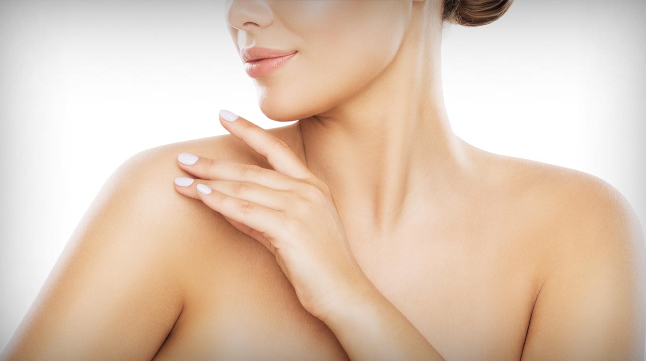Beauty Shoulder Skin Care, Woman Applying Moisturizer by Hands, Young Model Isolated over White Background