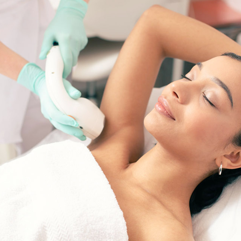 woman getting underarm laser hair removal