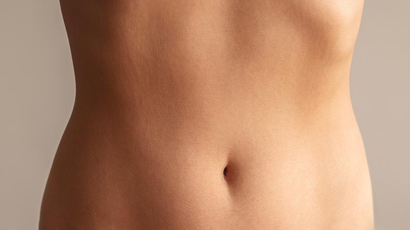 Perfect woman belly isolated on white background