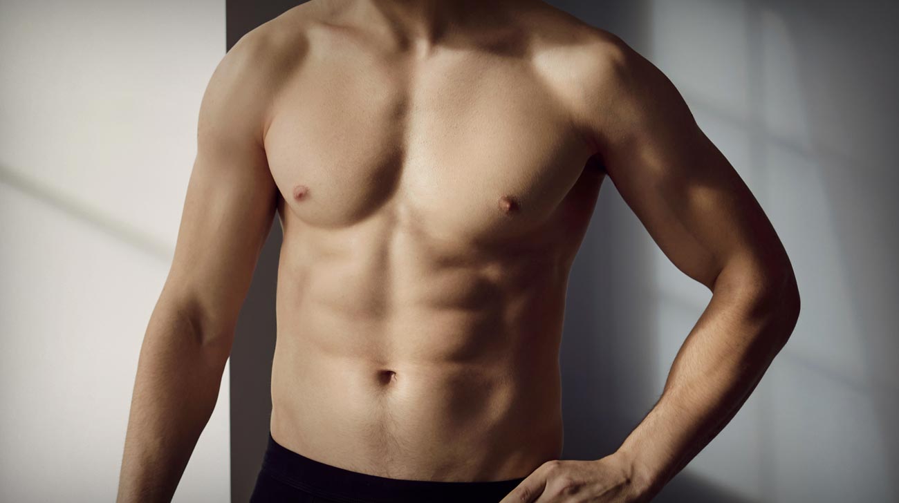 Handsome fit young man posing in underwear.